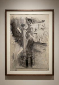 Contemporary charcoal figure drawing of a standing female nude, blending realistic anatomy with abstract tape elements. A mixed-media study on toned paper by Csaba Palotas - Life Drawing MK.