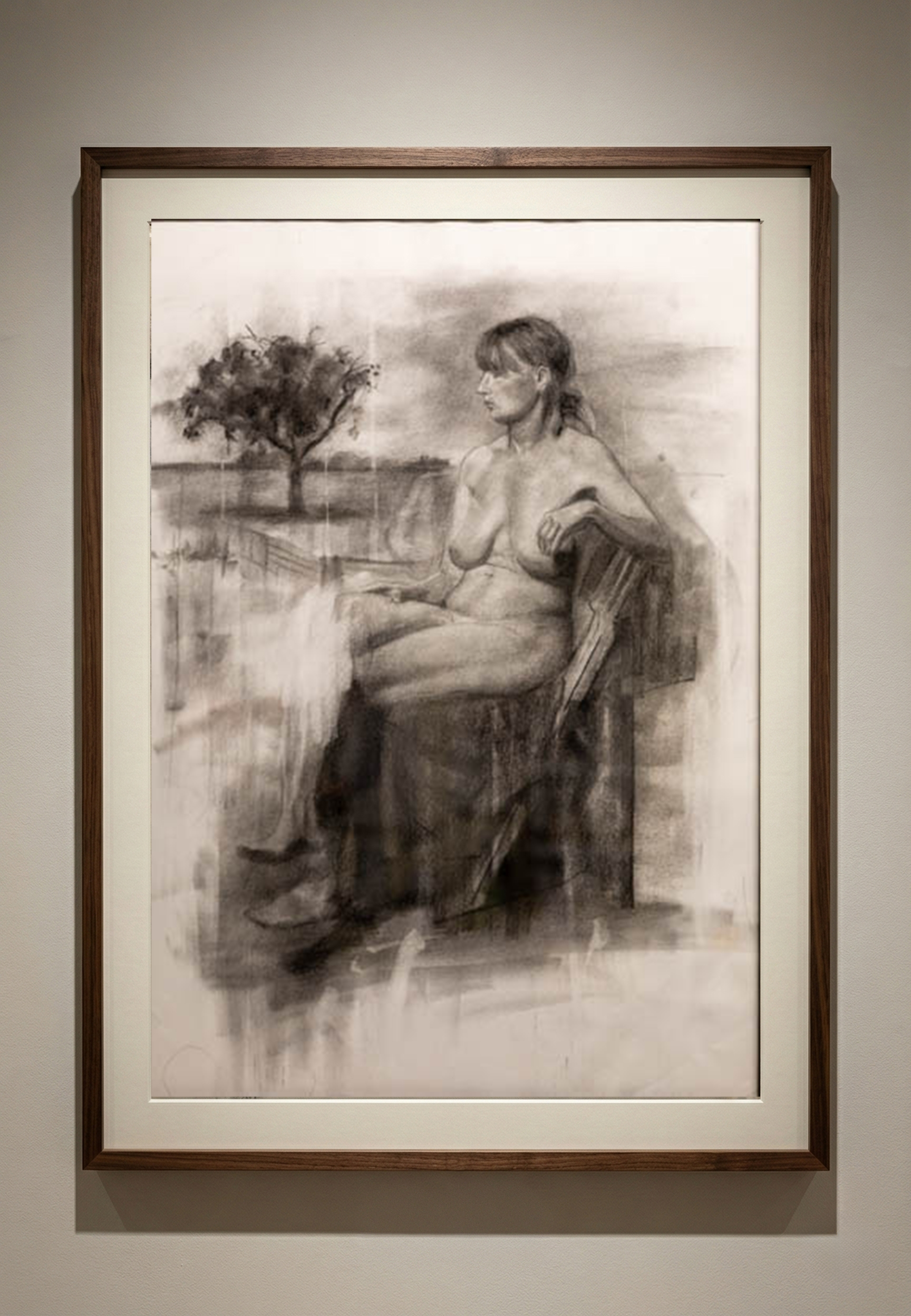 Moody charcoal drawing of a seated female nude outdoors with a tree in the background. The drawing focuses on tone, atmosphere, and soft light. Art by Csaba Palotas, Milton Keynes.